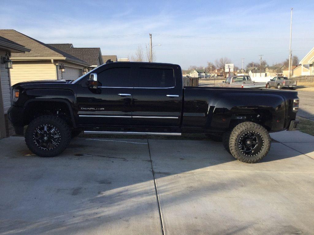 All black 2016 GMC Sierra 3500 Denali Lifted Dually