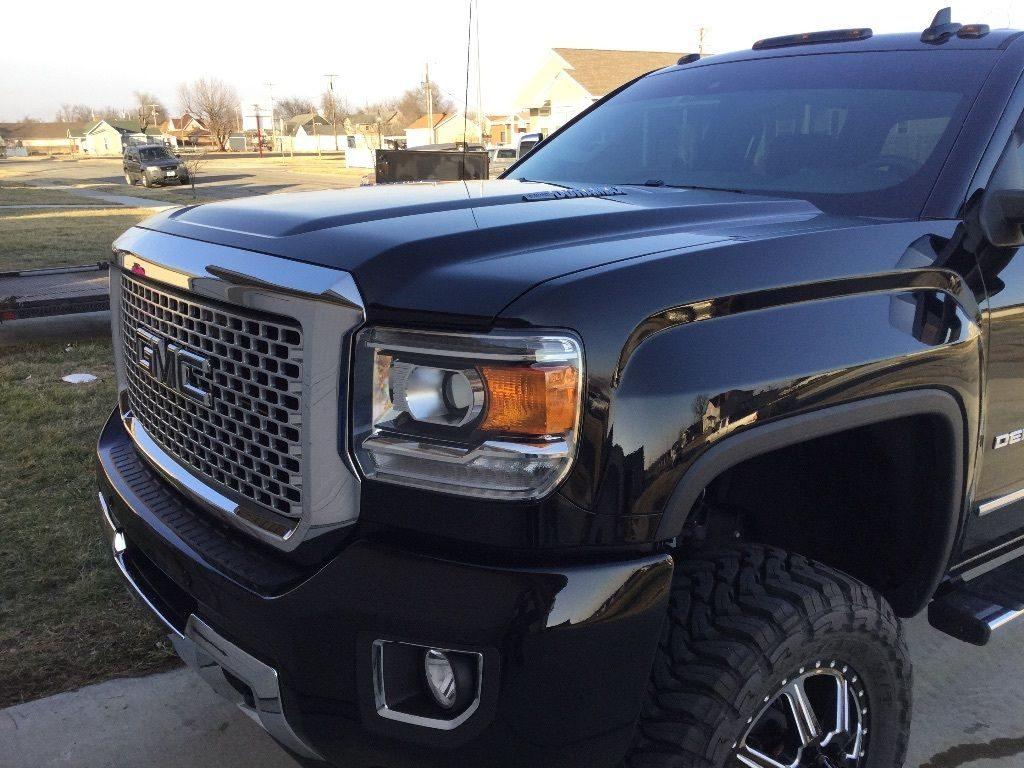 All black 2016 GMC Sierra 3500 Denali Lifted Dually