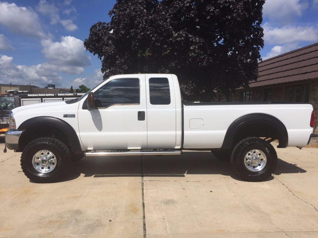 Garage kept 2004 Ford F 350 XLT lifted