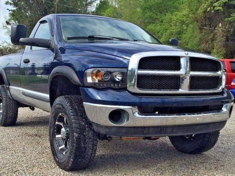 Smooth driver 2003 Dodge Ram 2500 slt lifted for sale