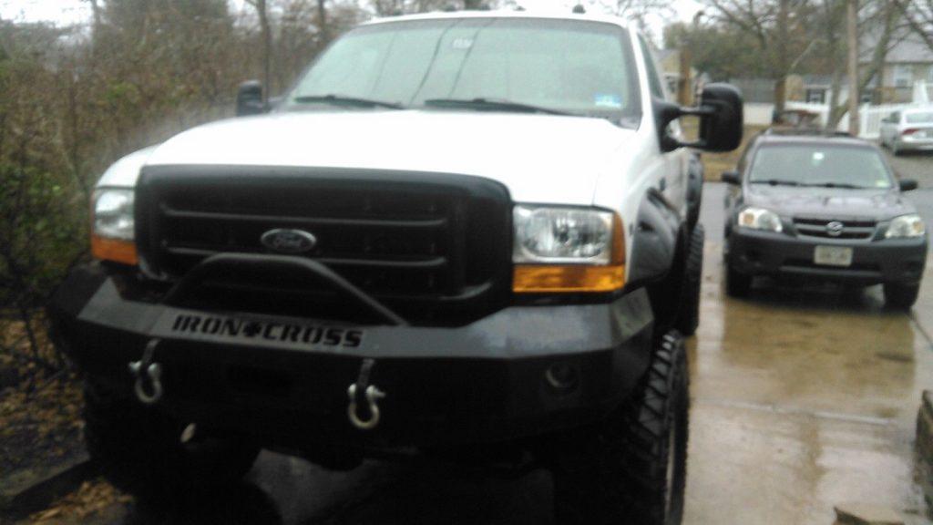 customized 1999 Ford F 250 Extended Cab XLT lifted