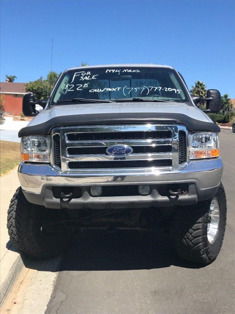 very clean 2001 Ford F 250 XLT lifted