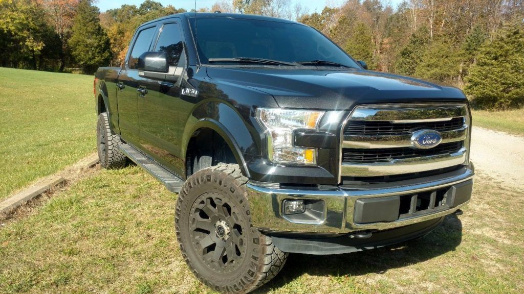 low miles 2015 Ford F 150 Lariat lifted