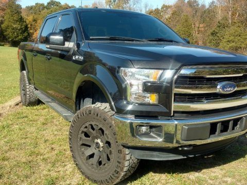 low miles 2015 Ford F 150 Lariat lifted for sale