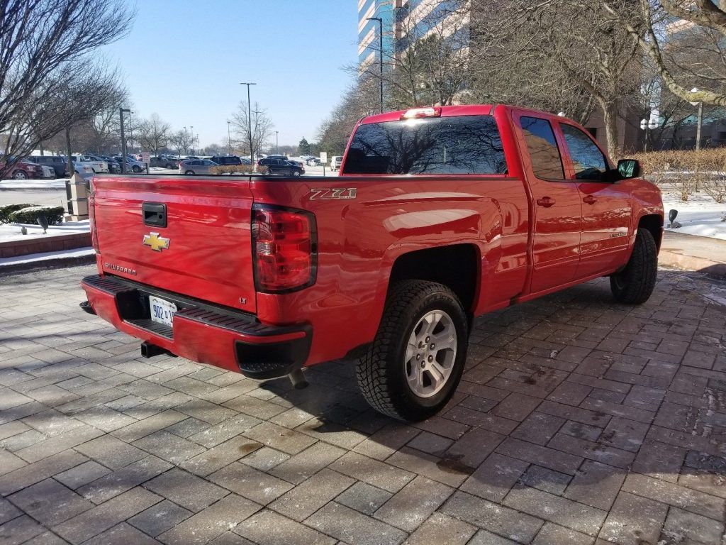 well equipped 2016 Chevrolet Silverado 1500 LT Extended Cab lifted