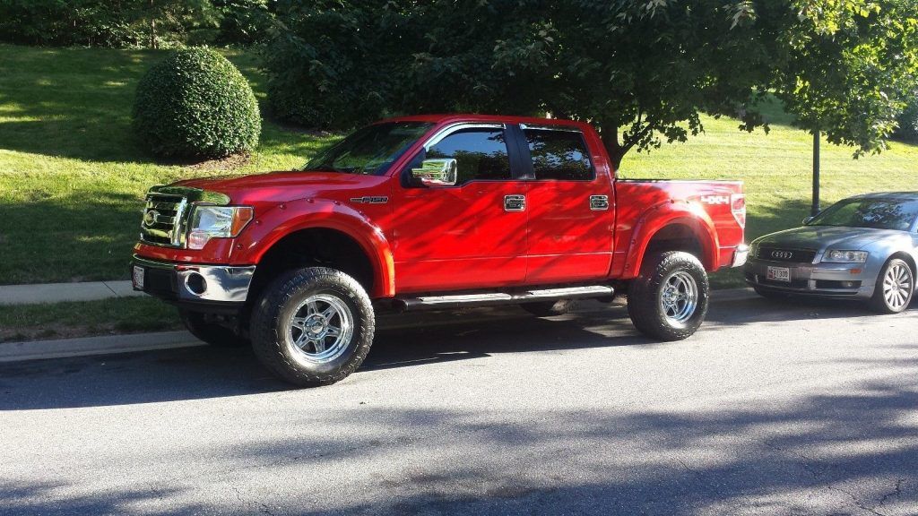 low miles 2011 Ford F 150 lifted