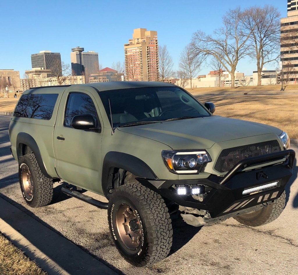 camper shell 2012 Toyota Tacoma lifted