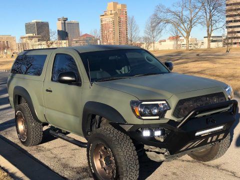 camper shell 2012 Toyota Tacoma lifted for sale