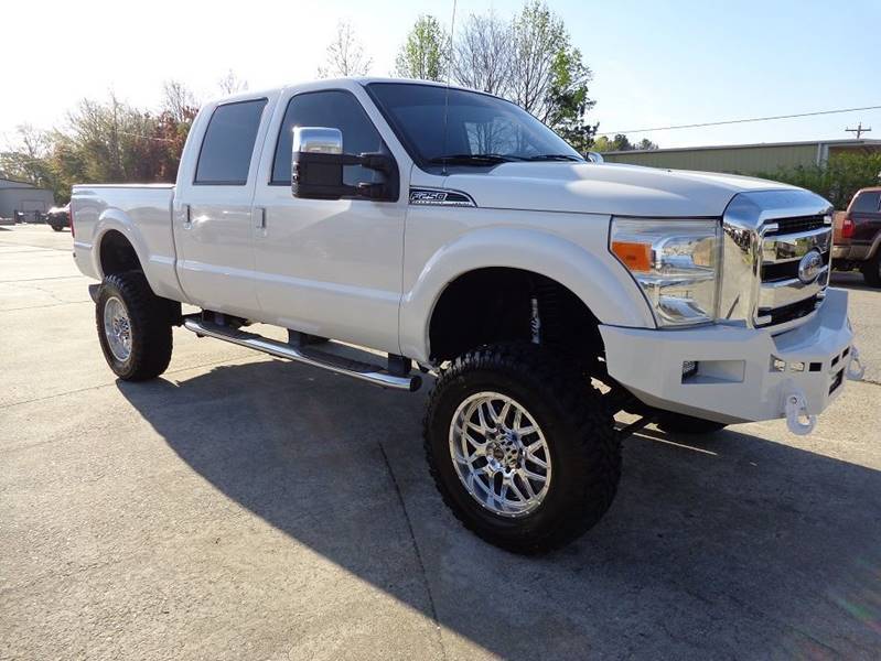 tons of options 2011 Ford F 250 Lariat 4×4 lifted