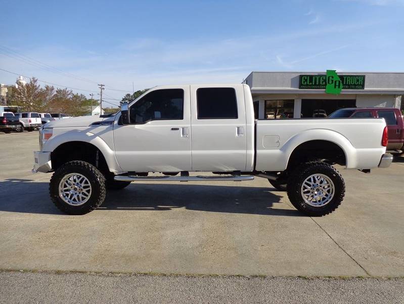 tons of options 2011 Ford F 250 Lariat 4×4 lifted