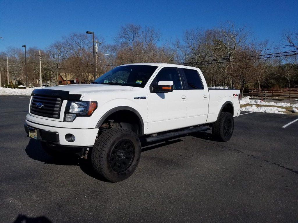 well equipped 2011 Ford F 150 FX4 SUPERCREW lifted