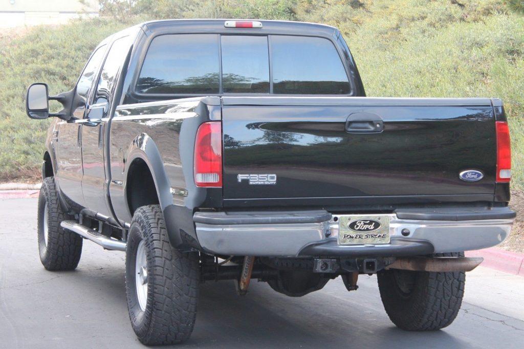 short bed 2002 Ford F 350 Lariat CREW CAB lifted