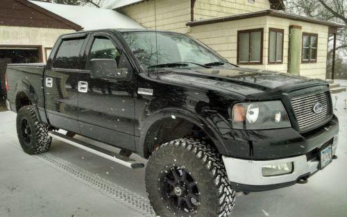 lifted 2004 Ford F 150 pickup