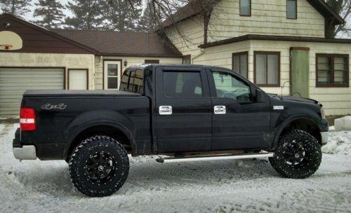 lifted 2004 Ford F 150 pickup