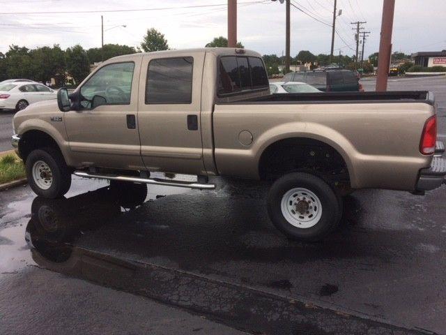 ready to roll 2003 Ford F 250 lifted truck