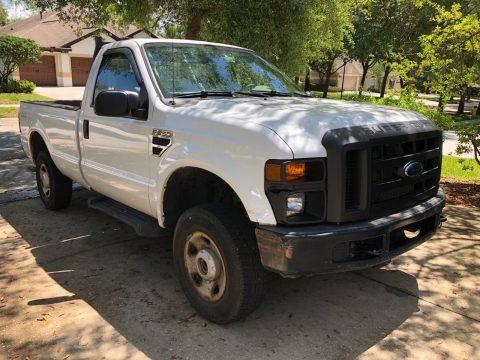 rusty 2008 Ford F 250 XL pickup lifted for sale
