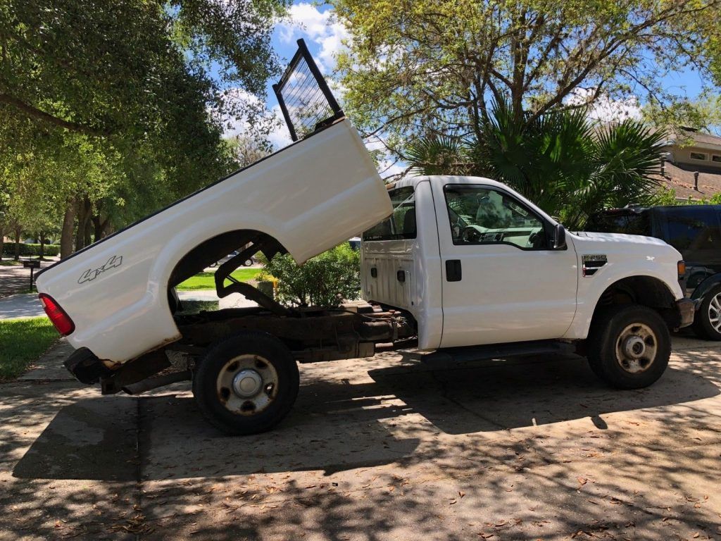 rusty 2008 Ford F 250 XL pickup lifted