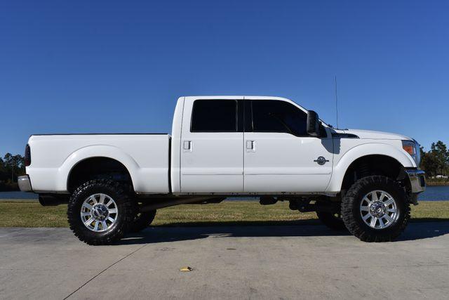 very clean 2011 Ford F 250 Lariat lifted