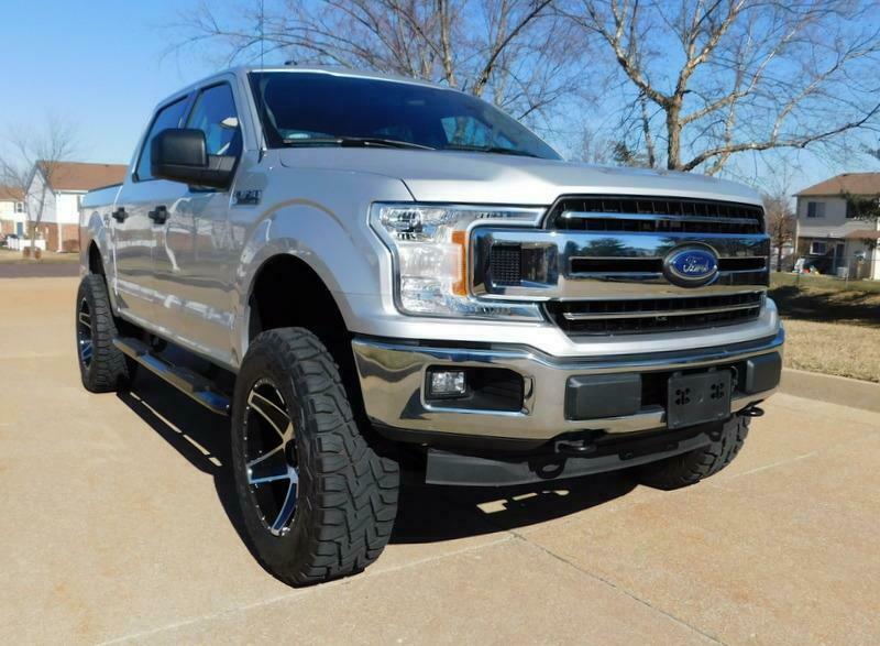 low mileage 2018 Ford F 150 XLT lifted