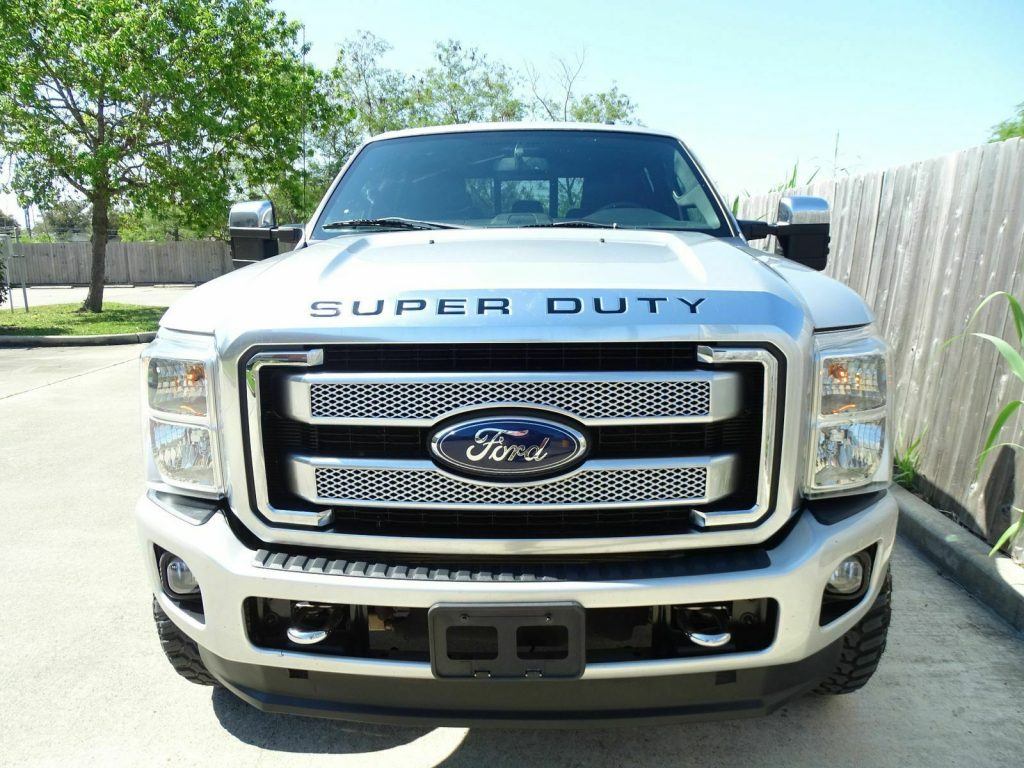 loaded 2013 Ford F 350 Lariat lifted