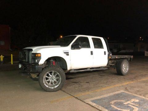 runs fantastic 2008 Ford F 350 flatbed lifted for sale