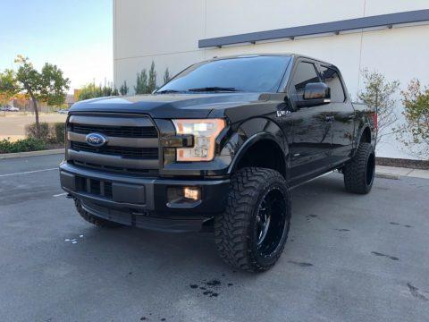 clean 2015 Ford F 150 Lariat pickup lifted for sale
