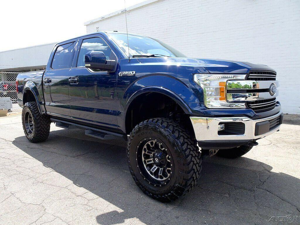 low miles 2018 Ford F 150 Lariat pickup lifted