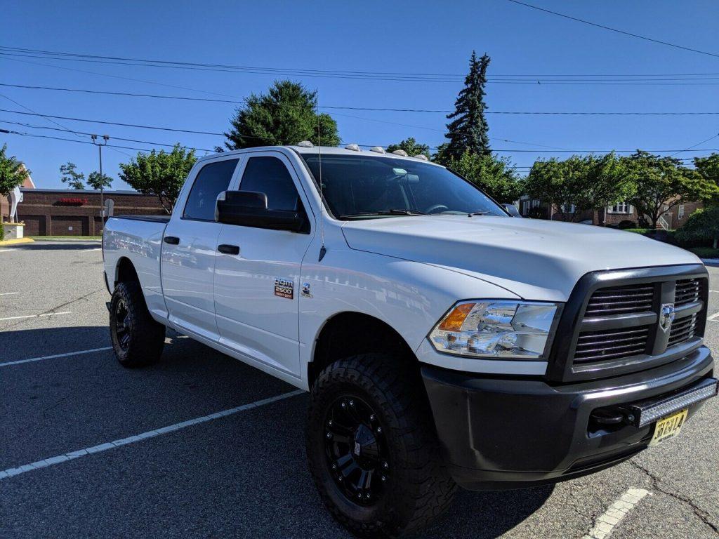 low miles 2012 Dodge Ram 2500 ST lifted