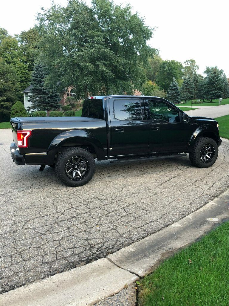 loaded 2015 Ford F 150 XLT lifted