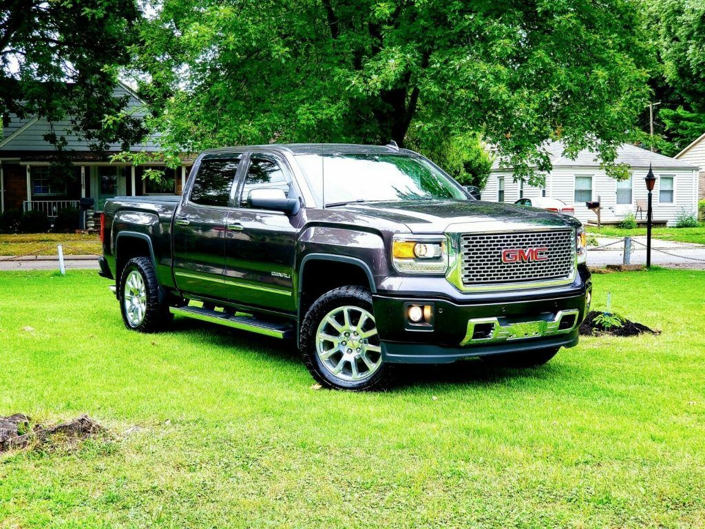 top of the line 2015 GMC Sierra 1500 Denali lifted