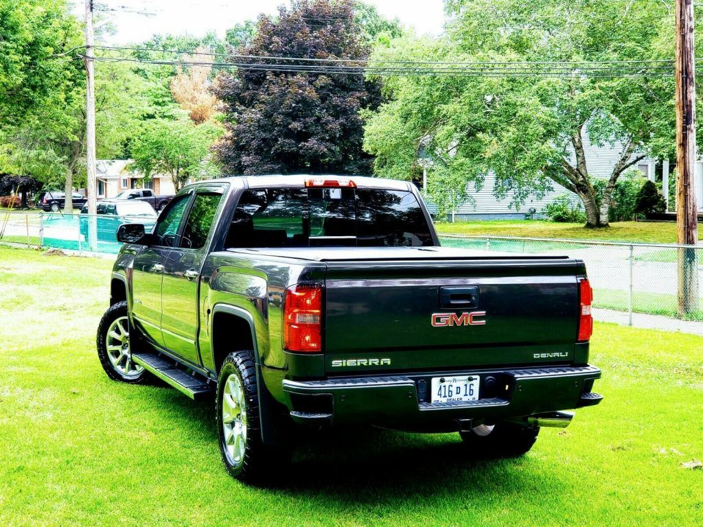 top of the line 2015 GMC Sierra 1500 Denali lifted
