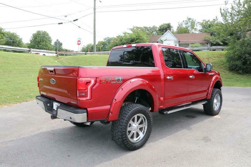 very low miles 2016 Ford F 150 Lariat Supercrew lifted