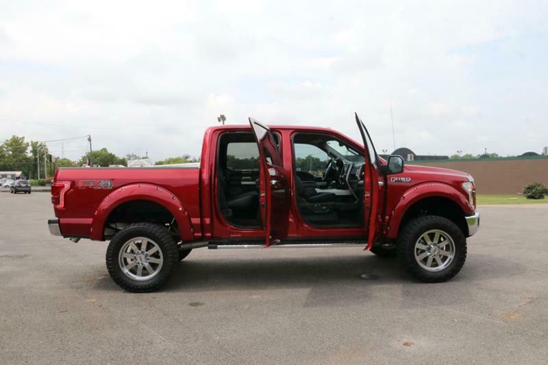 very low miles 2016 Ford F 150 Lariat Supercrew lifted