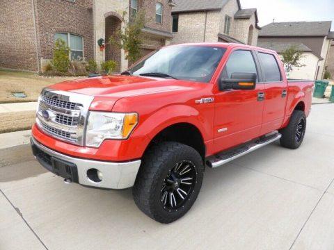 very nice 2014 Ford F 150 4WD Supercrew 145 XLT lifted for sale