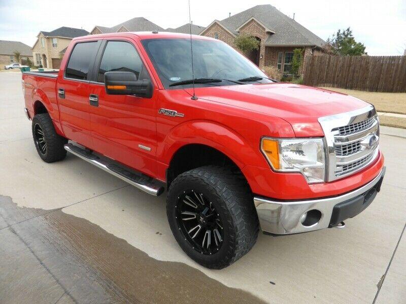 very nice 2014 Ford F 150 4WD Supercrew 145 XLT lifted
