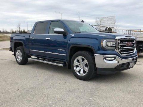 Loaded and low miles 2018 GMC Sierra SLT 1500 lifted for sale