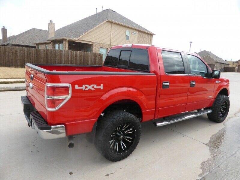 needs nothing 2014 Ford F 150 4WD Supercrew 145 XLT lifted