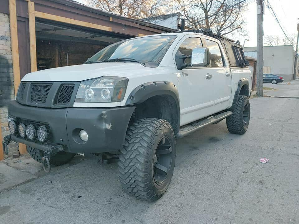 upgraded 2004 Nissan Titan LE lifted