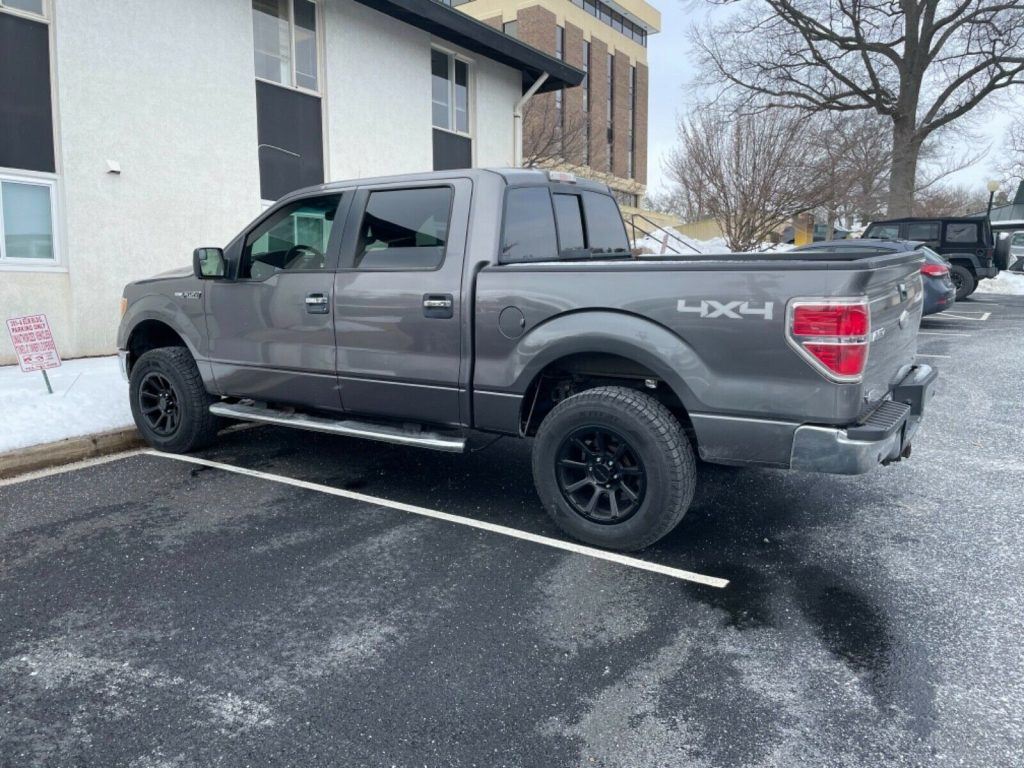 2011 Ford F-150 lifted [well serviced]