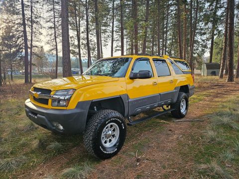 2003 Chevrolet Avalanche K2500 3/4ton 4&#215;4 lifted [1 of 34 with yellow paint] for sale